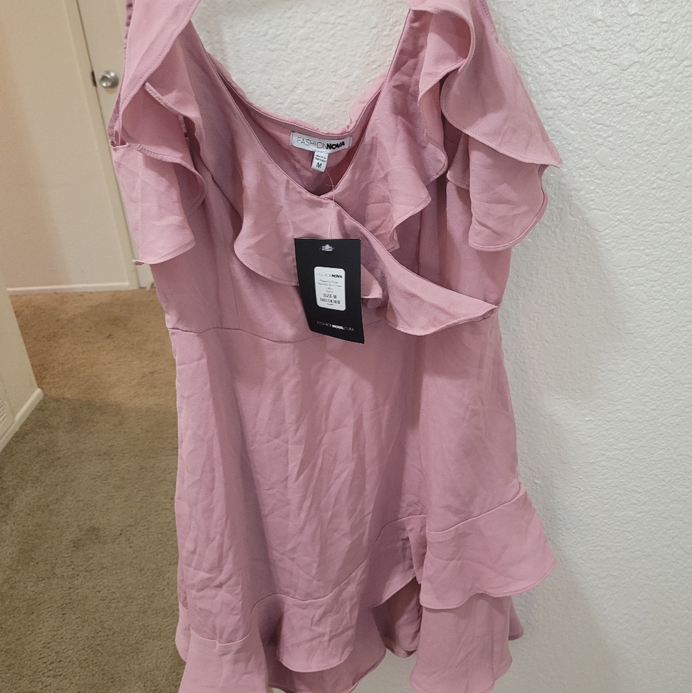 Flowy pink summer dress with ruffles